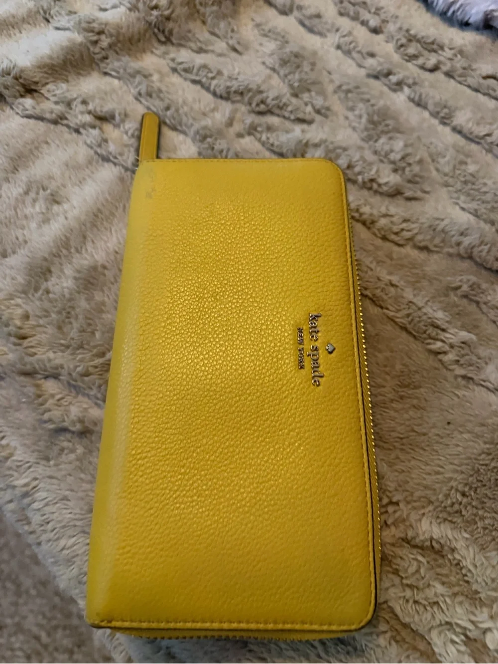 kate spade pebbled yellow zip-around wallet